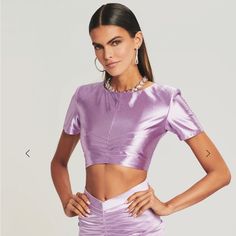 Nwt - Metallic Purple Crop Top In Beautiful Fabric. Never Worn And Still Has Tags. Ordered It And Didn’t Love The Fit For Myself! Also Selling The Skirt That Matches For A Bundle Purple Satin Party Top, Chic Purple Crop Top For Party, Purple Crop Top, Beautiful Fabric, Color Purple, Crop Top, Womens Tops, Crop Tops, Skirt