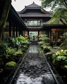 a large building with lots of trees and plants