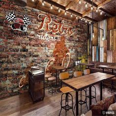 a restaurant with brick walls and wooden tables