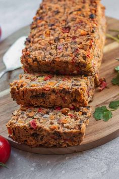 slices of meatloaf on a wooden cutting board