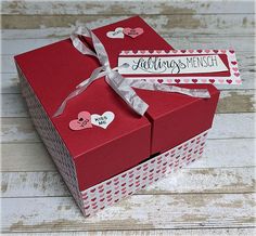 two valentine's day boxes with hearts on them