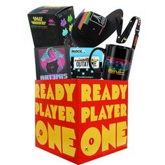 a box with some items in it that says ready ready player play one on the inside