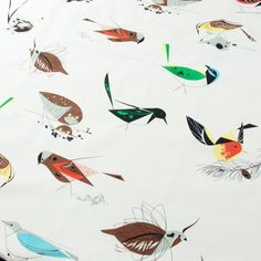 a white sheet with birds on it