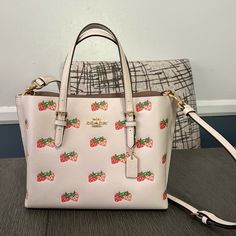 Questions? Leave A Comment Below! Coach Strawberry Bag White, Coach Mollie Tote, Coach Mollie, Strawberry Print, Coach Handbags, Leave A Comment, Coach Bags, Pink White, Shoulder Bags