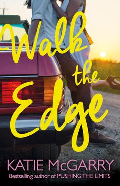 a man and woman standing next to each other near a car with the words walk the edge written on it