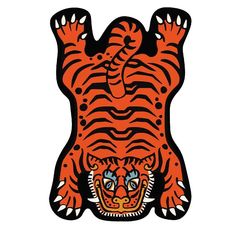 an orange and black tiger face with big claws on it's head, in front of white background