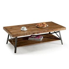 a wooden table with metal legs and a bowl of food on top