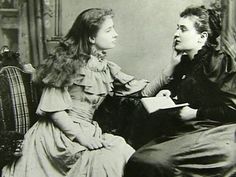 an old black and white photo of two women