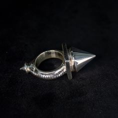 Here is one very nice Tuareg spike ring, it also looks great as a gothic ring, which ever style you prefer it is a great  gift or for any occasion. This boho style piece of jewelry looks excellent on any gender's hand, so treat yourself or a loved one to a very unique item. I also offer custom wooden ring boxes (see in listings in my shop) which would go well with this ring. This version is made out of silver, cast as a single piece of metal, so no glues or soldering, making it very sturdy and d Gothic Style Jewelry Metal Ring As Gift, Gothic Metal Rings For Collectors, Gothic Open Ring Jewelry, Gothic Open Metal Ring, Silver Jewelry With Custom Hardware As Gift, Gothic Collectible Metal Rings, Silver Jewelry With Custom Hardware Gift, Silver Punk Jewelry With Metal Ring, Punk Style Silver Jewelry With Metal Ring