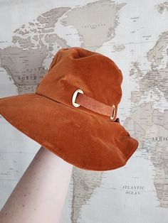 This wonderful orange velvet hat is a treasure! The tag reads "Belmar, New York, Paris".  Please don't hesitate to contact me if you have any questions!  For other unique vintage items, please browse our store, Rediscovered Roots, at RediscoveredRoots.etsy.com. We love giving new life to previously loved items! Vintage Adjustable Corduroy Hat, Velvet Bucket Hat, Vintage Orange Hat With Curved Brim, Vintage Corduroy Cap, Vintage Orange Snapback Hat, Velvet Hat, Orange Velvet, Vintage Orange, Unique Vintage