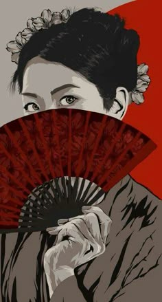 a woman holding a red fan in front of her face