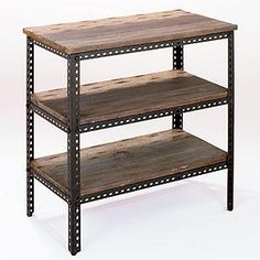 three tiered wooden shelf with rivets on the bottom and one shelf below