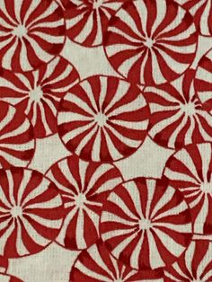 red and white fabric with circles on it