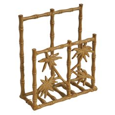 a bamboo rack with two small plants on it