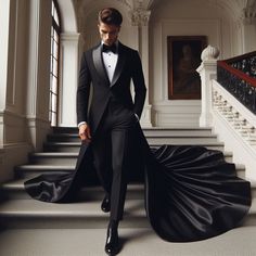 a man in a tuxedo is walking down the stairs wearing a long black dress