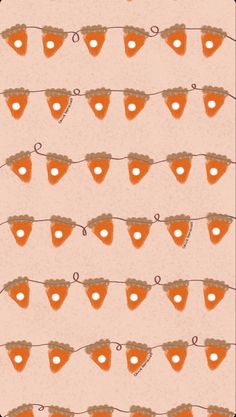 an orange and white wallpaper with hearts on the clothes line, which reads love is in the air