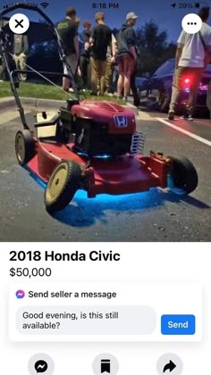 a red lawn mower sitting in the middle of a parking lot next to people