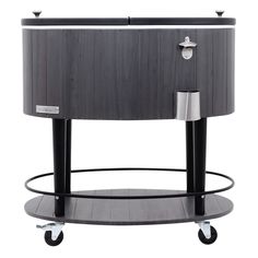 a black and grey cooler sitting on top of a metal stand with wheels around it