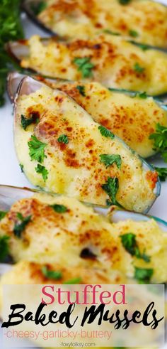 stuffed baked mussels with parsley garnish on top and text overlay that reads stuffed baked mussels