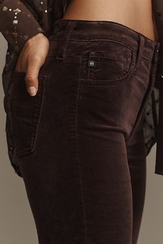 Denim, decoded: We’re digging denim in every corner of our closet. The AG Farrah Jeans offer a high-rise and bootcut leg, now in a velvet fabric. | AG Farrah High-Rise Bootcut Jeans: Velvet Edition by AG Jeans in Purple, Women's, Size: 27, Cotton/Rayon/Viscose at Anthropologie High Rise Bootcut Jeans, Ag Jeans, Modern Wardrobe, 50 Fashion, Premium Denim, Velvet Fabric, Bootcut Jeans, Clothes For Sale, Clothing And Shoes