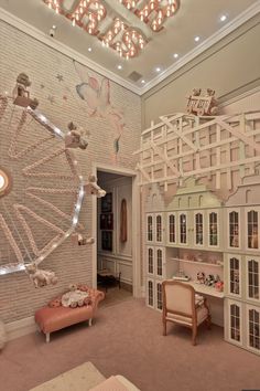 a room with a large ferris wheel on the wall