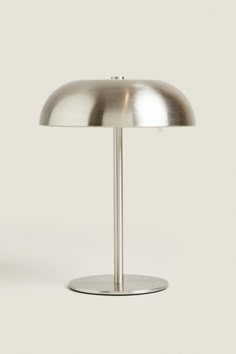 an image of a table lamp that is on the white background with no one around it