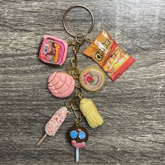 a keychain that has some food on it