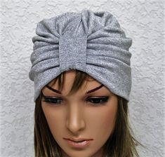 Women's turban hat. The turban is really modern, nice and comfortable head accessory. Made by me in the United Kingdom. I make these turbans in three different sizes : S- 51-54 cm (20-21 inches) in circumference M- 54-57 cm (21-22.5 inches) in circumference L- 57-60 cm (22.5-23.5 inches) in circumference Hand wash ,cold wash , Minimum Wash, Short Spin,Do Not Wring,Do Not Iron, Do Not Bleach. All items I made myself in a smoke free and pet free home studio. I live in the UK and wanted to notify w Summer Stretch Turban, Adjustable Beanie Turban For Winter, Elegant Adjustable Beanie Turban, Elegant Beanie-style Turban, Elegant One-size Beanie Turban, Trendy Summer Party Headscarf, Summer Party Turban, Party Turban Hat, Adjustable Knotted Turban