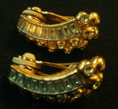 "These gorgeous Elizabeth Taylor clip on earrings are part of the 1995 Evening Star collection exclusive to Avon. The earrings measure 1 1/4\" and 7/8\" wide. They appear in Identifying Avon Jewelry on page 29 where we find that they originally sold for $120. This pair is in excellent vintage condition with no missing rhinestones. The clips are in perfect working order. They are hallmarked on the inside back with Taylor's cursive \"E\" and \"Elizabeth Taylor.\" Very difficult to photograph, but Cursive E, Sarah Ross, Evening Star, Yellow Cat, Avon Jewelry, Laurel Burch, Pin Pendant, Elizabeth Taylor, Cool Costumes