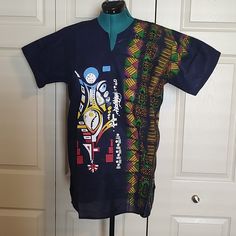 Dashiki Men Shirt Women Top Adire Kampala Haute Blouse Batik Size 10/12. This Is A Very Beautiful Handmade African Kampala Adire, It Is Unisex. Measurements Laying Flat On The Floor Are: Length: 32" Pit To Pit: 21" Sleeve: 9" Waist: 21.5 Please Ask, If You Might Have Any Questions About The Shirt/ Blouse. Thanks For Viewing. Kampala Top For Men, Handmade African, Design Dresses, African Design Dresses, Men Shirt, African Design, Shirt Women, Blue Yellow, Batik