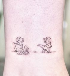 two small dinosaurs on the ankle