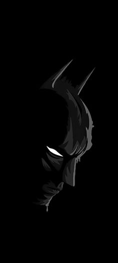 the batman logo is shown in black and white, as well as an image of it's face