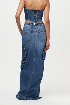 A new take on modern utility. A versatile wardrobe staple, our denim maxi skirt is made from 100% cotton with a softened hand and exaggerated front slit, giving you the structure you want with effortless wearability. Details include functional cargo pockets and adjustable waist feature. Denim Collection Self: 100% Cotton Lining: 96% Polyester, 14% Spandex Model wears size X-Small True to size Modern Utility, Denim Cargo, Denim Maxi, Versatile Wardrobe, Denim Maxi Skirt, Denim Collection, Wardrobe Staples, Fashion Illustration, Denim Skirt