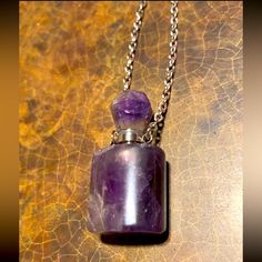 Womans Women’s Females Female Girl Girls Teenage Teenager Women Woman Woman’s Fashion Protection Accessories Accessory Great Gift Idea Necklace Jewelry Crystal Bottle Gemstone Mini Flask Style Neck Lace Crystal Carved Natural Polished Gem Stone Necklace Purple Amethyst Bottle Perfume Bottle Necklace Silver Chain 18” - 20” No Tarnish No Rust No Fade Hypoallergenic To Keep Perfume , Essential Oil Oils , Love Spells , Protection Spell , Potion Secret Note Letter , Healing , Holy Water Tags Witches Spell Bottle Necklaces, Goddess Crystals, Spells Protection, Potion Necklace, Gem Stone Necklace, Heart Stone Necklace, Crystal Bottle, Bottle Perfume, Protection Spell