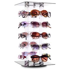 a display case with many pairs of sunglasses on it