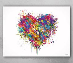 a colorful heart shaped painting on a white wall