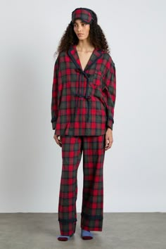 Our Antonella pyjama set in red tartan is comfortingly classic, with a contemporary twist in the bow details. • Top and bottoms • Matching storage bag included • Matching eye mask available • Button-down front • Chest pocket • Elasticated waist with functional tie • 100% organic cotton • Designed in London • Made in India MODEL INFO: Model 1 is 5'10 and is wearing a UK 8. Damson Madder, Cosy Vibes, 2024 Wishlist, London Models, Cute Pajama, Cotton Pjs, Cute Pajama Sets, Checked Scarf, Ideal Wardrobe