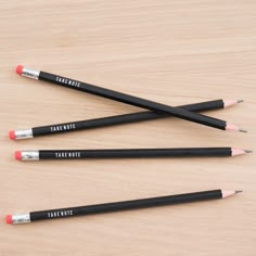 four pencils with the words take note written on them