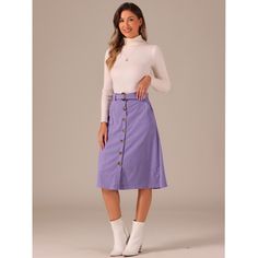 Indulge in a perfect blend of comfort and style with this ribbed corduroy A-line skirt. The high-fitted waist and slightly flared hem add a touch of elegance to the skirt, while the matching waist tie accentuates your curves, creating a flattering silhouette. The elastic waist and belted detail make it comfortable to wear all day long. This versatile skirt is suitable for any occasion, be it a party, a day out shopping, or a day at the office. The midi length adds a touch of sophistication to th Mid-rise Skirt With Belt Loops In Medium Wash, Spring Non-stretch Purple Skirt, Non-stretch High Waist Denim Skirt With Button Closure, Mid-rise Medium Wash Skirt With Button Closure, Purple Relaxed Fit Knee-length Skirt, Corduroy Midi Skirt, Picnic Skirt, Midi Sweater Skirt, Skirt Purple