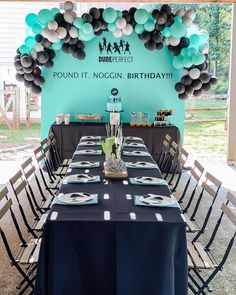 a table set up for a birthday party