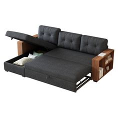 a sofa bed with pull out drawers and storage underneath the couch is made from dark gray fabric