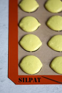 there are nine cookies that have been placed in a muffin tin with the word slipat on it