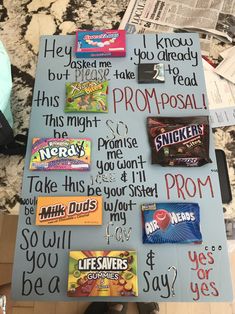 a table covered in candy and writing on it