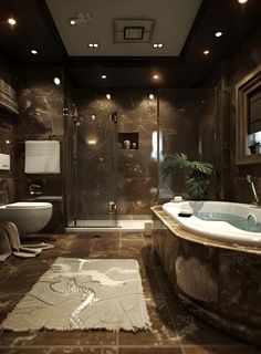 a bathroom with a bathtub, toilet and sink in the middle of the room