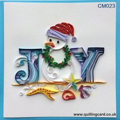 a christmas card with a snowman on it's face and the word joy