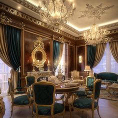 a fancy dining room with chandelier and green velvet upholstered chairs around a round table