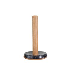 a black marble base with a wooden stick sticking out of it's center piece