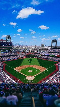 a baseball stadium filled with lots of people