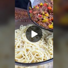 the video shows how to make pasta with ground beef and veggies on top