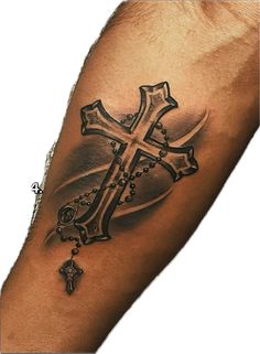 a man's arm with a cross and rosary tattoo on the left side of his arm